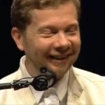 A photo of Eckhart Tolle smiling and talking about our essential nature